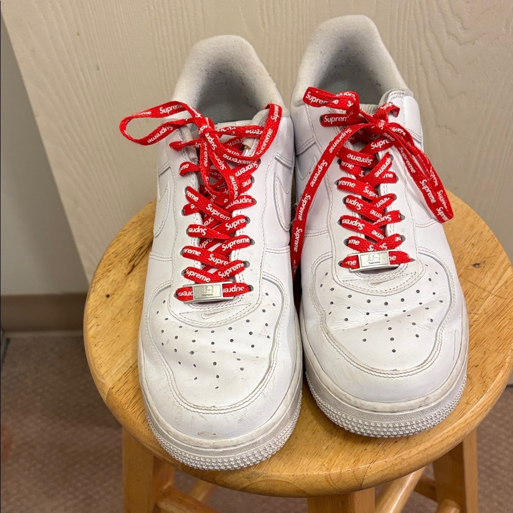 Supreme White Sneakers with Red Logo